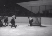  clears the puck away from , November 4, 1939.