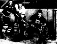 Jack Gelineau and Murray Henderson defend against Ray Timgren in Game 2 of the 1951 Semi-finals, March 31, 1951.