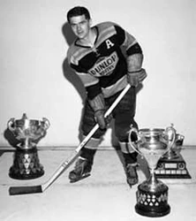 Hockey Hall of Fame member Harry Sinden with Allan Cup