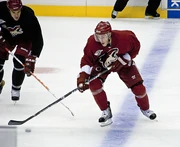 Turris and teammate  (left) practising with the 