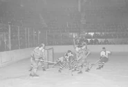 Thompson defends the net while #7 Weiland, #9 Goldsworthy assist against the Canadiens, February 24, 1938.