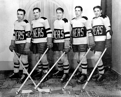 The five Bentley Brothers with the Miners. Courtesy:Alberta Culture & Community Spirit