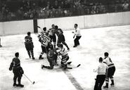 Kenny Smith scraps with Maurice Richard, October 15, 1950.