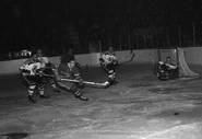 Willie O'Ree, Charlie Burns, Bill Hicke, Ralph Backstrom, Leo Boivin and Bruce Gamble in 1961 action.