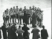 NHL President Frank Calder presents the Stanley Cup to , April 16, 1939.