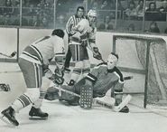 Frank Mahovlich scores on Ernie Wakely as Wayne Dillon looks on, February 26, 1975.