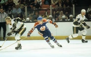 John McKenzie, Wayne Gretzky, Marty Howe in 1978-79 season action.