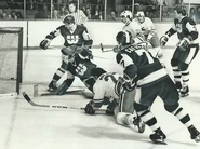Frank Mahovlich scores on Al Smith, October 15, 1974.