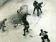 Phil Watson scores on Mike Karakas while #8 Alex Levinsky and #15 Cully Dahlstrom look on, February 1, 1938.