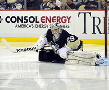 Fleury stretching during a 2011 game.