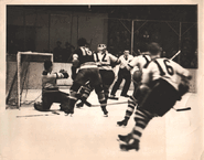 Bruins Tiny Thompson, #12 Flash Hollett, #16 Ray Getliffe defend against Rangers #15 Phil Watson at MSG, December 31, 1936.