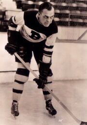 New GM  had played briefly for the Bruins in 1934.