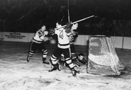 1945-46-Bruce-Cain-Chi.jpg (206 KB) Don Gallinger and Herb Cain of the Bruins battle Chicago goalie Mike Karakas, March 17, 1946.
