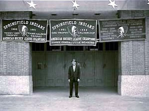  at arena entrance with championship banners