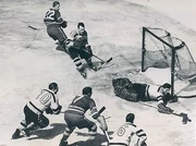 Brimsek makes a save while #10  and #16  assist. Game 5 of the 1949 Semi-Finals, March 30, 1949.