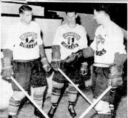 Balon, at left, with fellow rookie Bob Robinson (center) and coach Jackie McLeod with the Saskatoon Quakers in 1958.