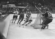 Tom Williams, Pete Stemkowski, Bobby Orr in 1966-67 action.