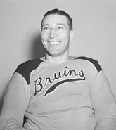 Dit Clapper in the gold jersey introduced in 1940.