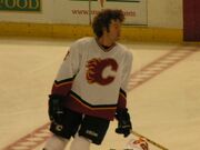 Mike Commodore of the Calgary Flames skates in a pre-game warm-up during the 2003-04 season
