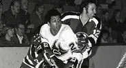 Alton White and Gary Jarrett in 1972-73 action.