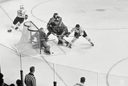 1969 All-Star game.jpg (56 KB) Glenn Hall stops Bobby Rousseau while #16 Bobby Hull (wearing a helmet) circles the net during the 22nd NHL All-Star game, January 21, 1969.