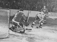 28Mar1946-Gallinger OT winner.jpg (130 KB) Don Gallinger scores the series winner OT goal on Detroit's Harry Lumley while Ted Lindsay watches on March 28, 1946.