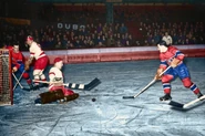 Normie Smith makes a save during 1938 Detroit Red Wings–Montreal Canadiens European tour, April 29, 1938.