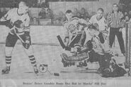 Bill Hay, Ted Green, Bruce Gamble, Bobby Hull in 1961-62 season action.