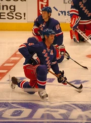 Shanahan (with the "A" on his jersey) warms up during a September 2007 pre-season game.
