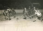 Real Chevrefils scores on Al Rollins, March 2, 1952.