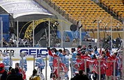 Penguins and Capitals alumni squads salute the crowd after the game.