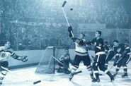 Doug Mohns, Terry Sawchuk, Fern Flaman, Lorne Ferguson during the 1956-57 season.