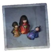 Renewed Doll- Three elegant puppets with the markings of the Rainmaker's family emblem embroidered on their skirts. They seem to be cherished family heirlooms of some sort.
