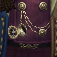 The locket hanging from Leo's jacket, shining brightly