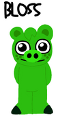 Bloss, a freckled porcine with a small tuff of hair.