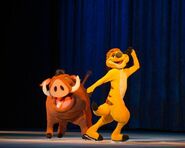 Timon and Pumbaa performing "Hakuna Matata".