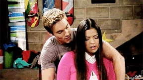 Logan helping Jasmine play the drums....much to his own delight