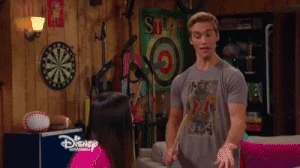 Logan helping Jasmine