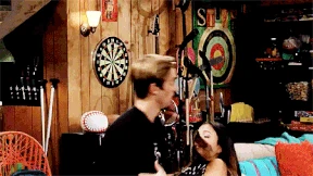 Logan leaning in, trying to kiss Jasmine!