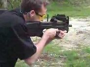 A man fires his P90