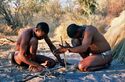 San Bushmen makeing fier in a Central County comune.