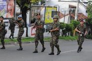 Boleshitist troops prepare to open fire on Elementist supporters as the siege of Icol turns into a full-fledged battle