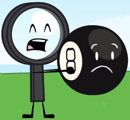 Magic-8 being held by Magnifying Glass.