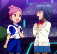 Sakura and Aoi celebrate their victory.