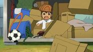 Young Endou founding a soccer ball.