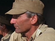 Leonard as the German truck driver