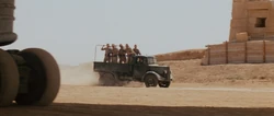 The  reinforcements arriving at the brawl.