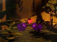 Two corrupted squirrel enemies in the background presumably in love with each other.