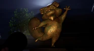 A golden statue of Rambley that doesn't appear in the finished game.