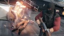 Delsin więzi dilera w obłoku dymu.